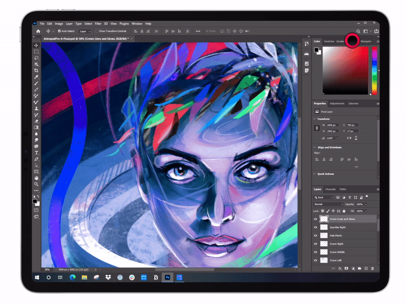 A digital drawing of a colorful woman's face on a tablet