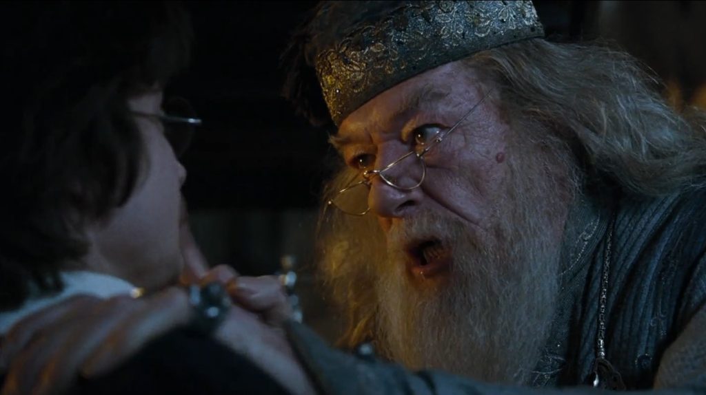 A photo of Dumbledore speaking with Harry Potter in The Goblet of Fire: "Soon we must all face the choice between what is right and what is easy."