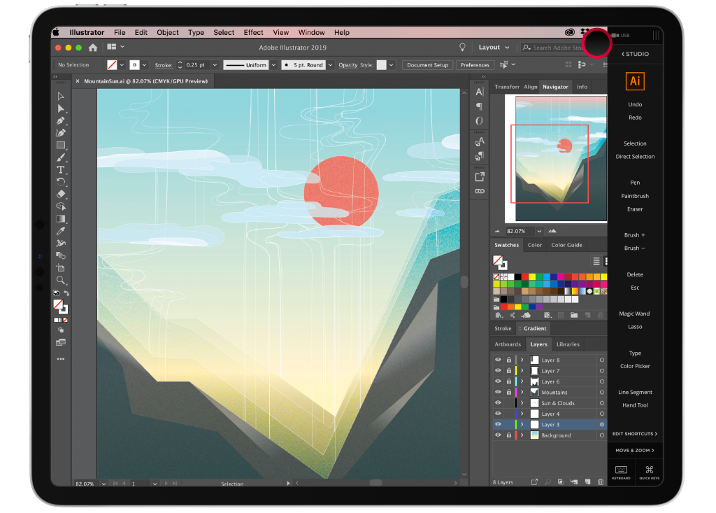 an iPad with Astropad Studio and and the illustrator app open. Drawing of a sun in the mountains on the screen.