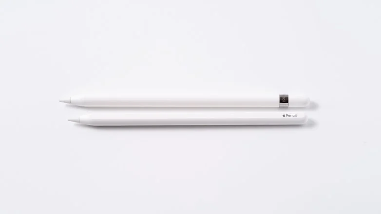 Apple Pencil 1 and Apple Pencil 2 laying side by side 