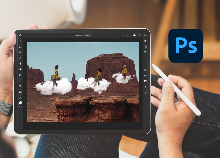 ipad with photoshop open and an image of people riding clouds on the screen 