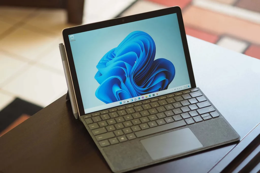 microsoft surface tablet on desk with connected keyboard and stylus 