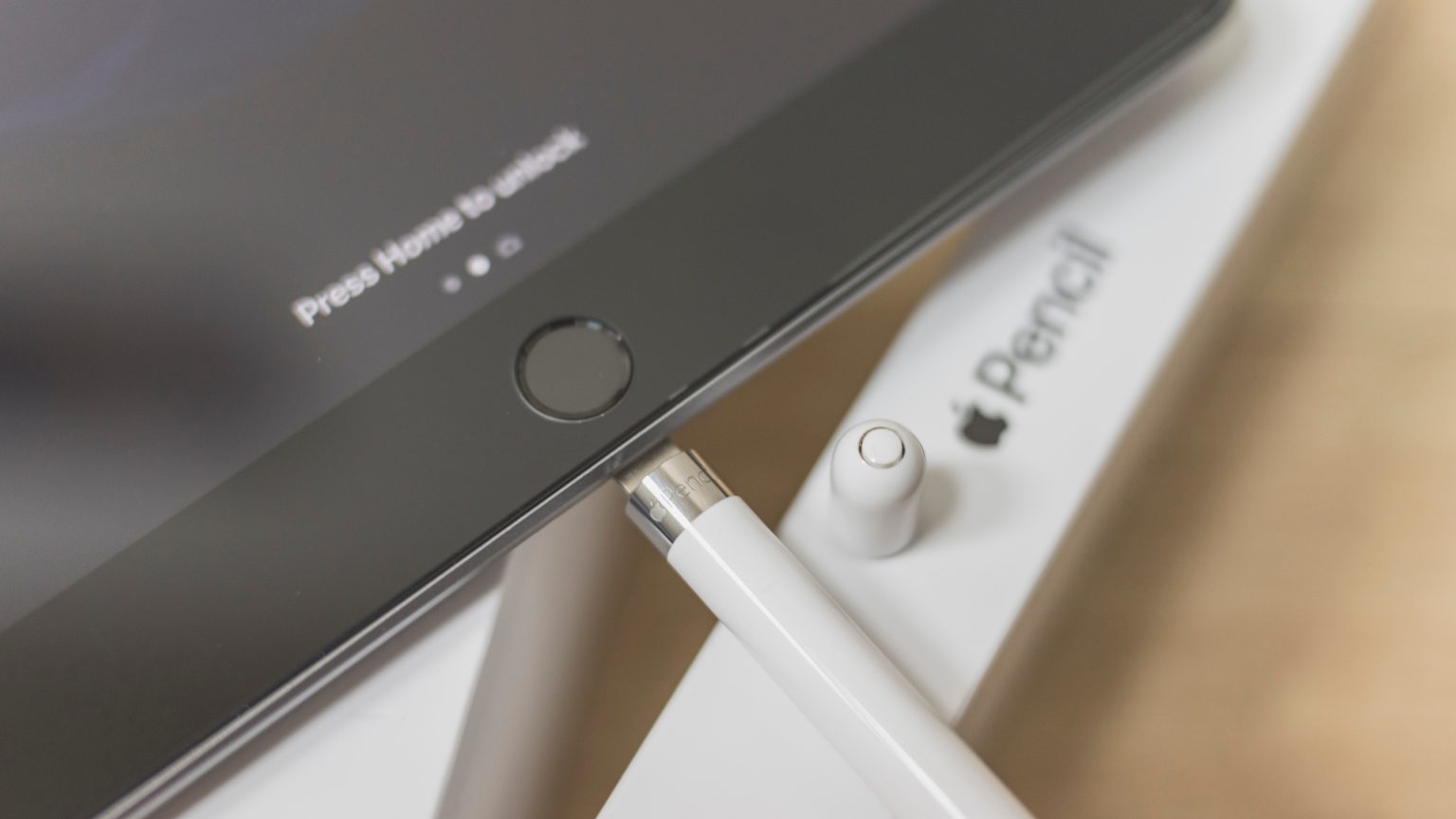 Apple pencil 1 charging, plugged into iPad