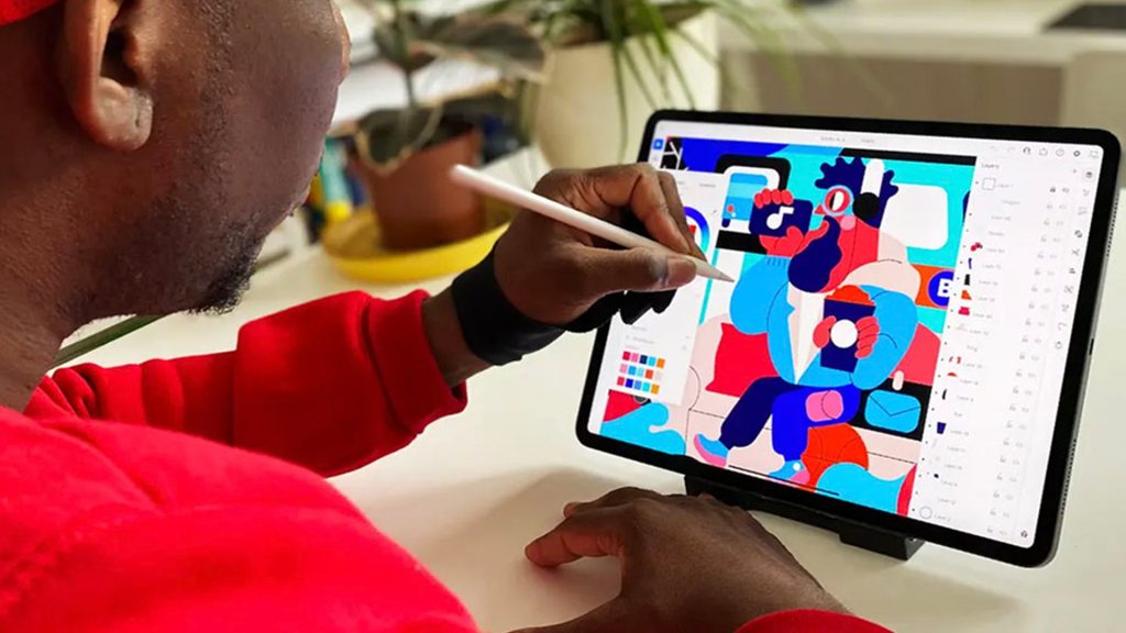 A person drawing with an Apple Pencil on an iPad in the Adobe Illustrator app. 